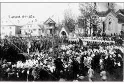 Merkine. The celebration on the square in front of church